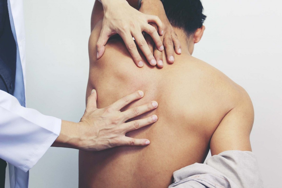 Neurosurgery Treatments in Pontiac, MI | Dr. Todd Francis, M.D. - hands-on-back-pain